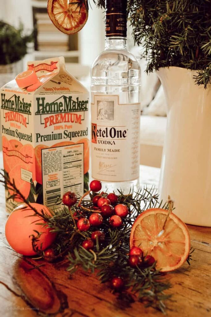 Orange juice carton, alcohol florals and oranges for DIY Ice Bucket.