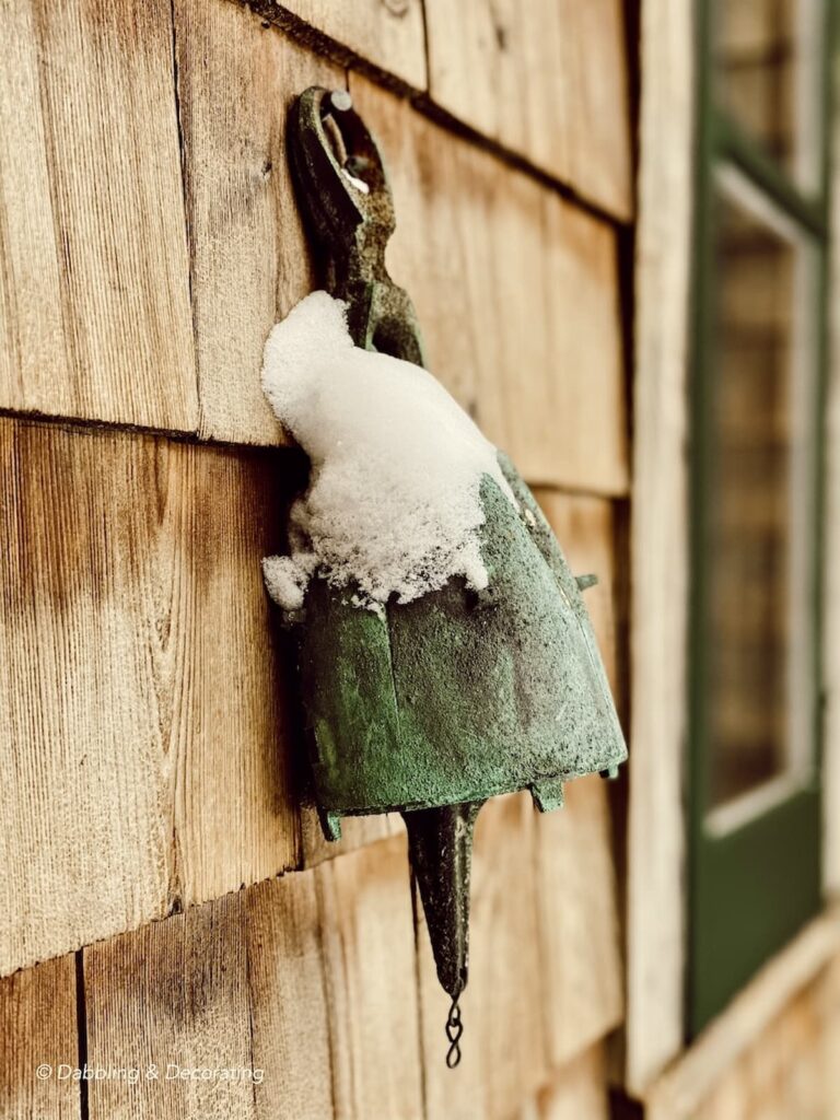 Antique Patina Bell on Cedar Shakes Home with Essex Green Trim