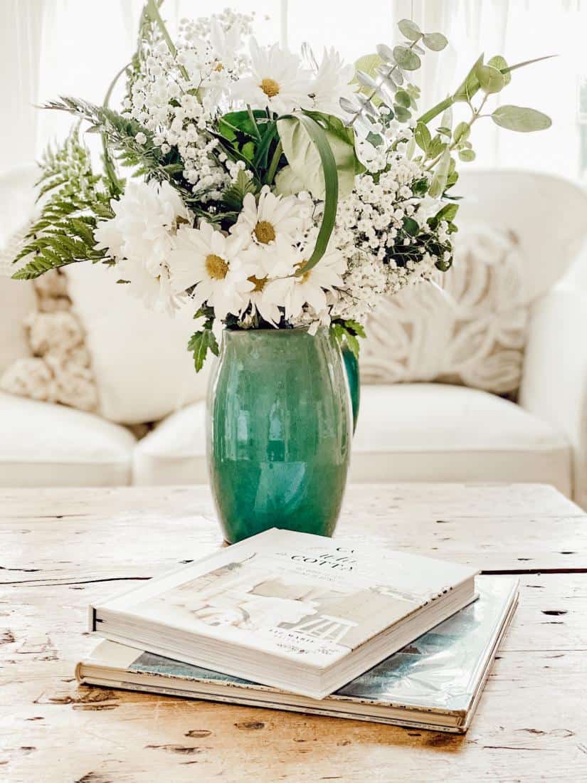 A bouquet of flowers in a vase on a table