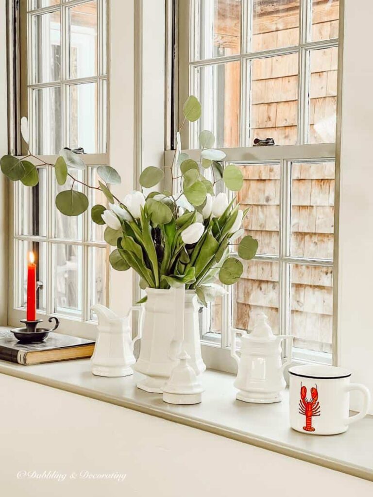 Vintage decorative decor on windowsill in the winter.