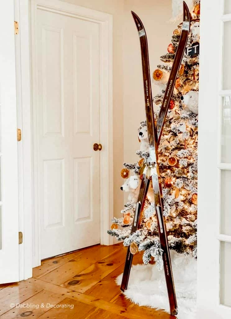 Vintage cross country skis crisscrossed on Christmas Tree.