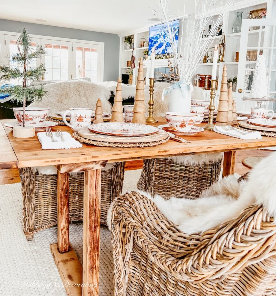 https://www.dabblinganddecorating.com/wp-content/uploads/2022/12/Cozy-Winter-Dining-Room-with-Ski-Lodge-Decor-_-Get-the-Look-4-956x1024.jpg