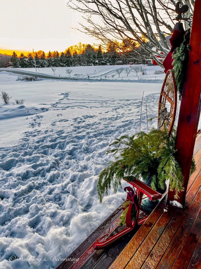 https://www.dabblinganddecorating.com/wp-content/uploads/2022/12/Ski-Lodge-Winter-Porch-Decor-on-Full-Display-18-768x1024.jpg