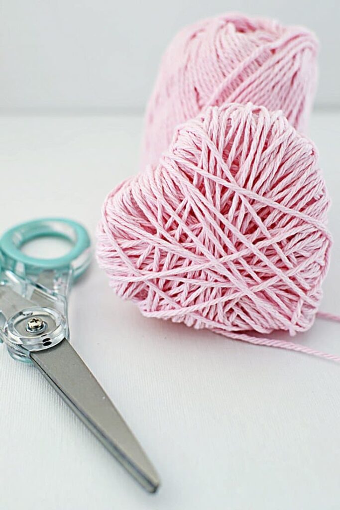 Pink DIY Heart Garland Craft with Scissors