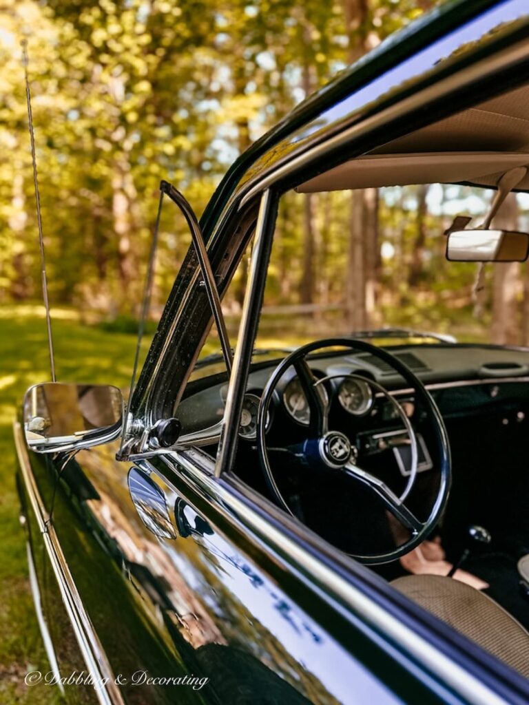 Vintage car Window and Steering Wheel.