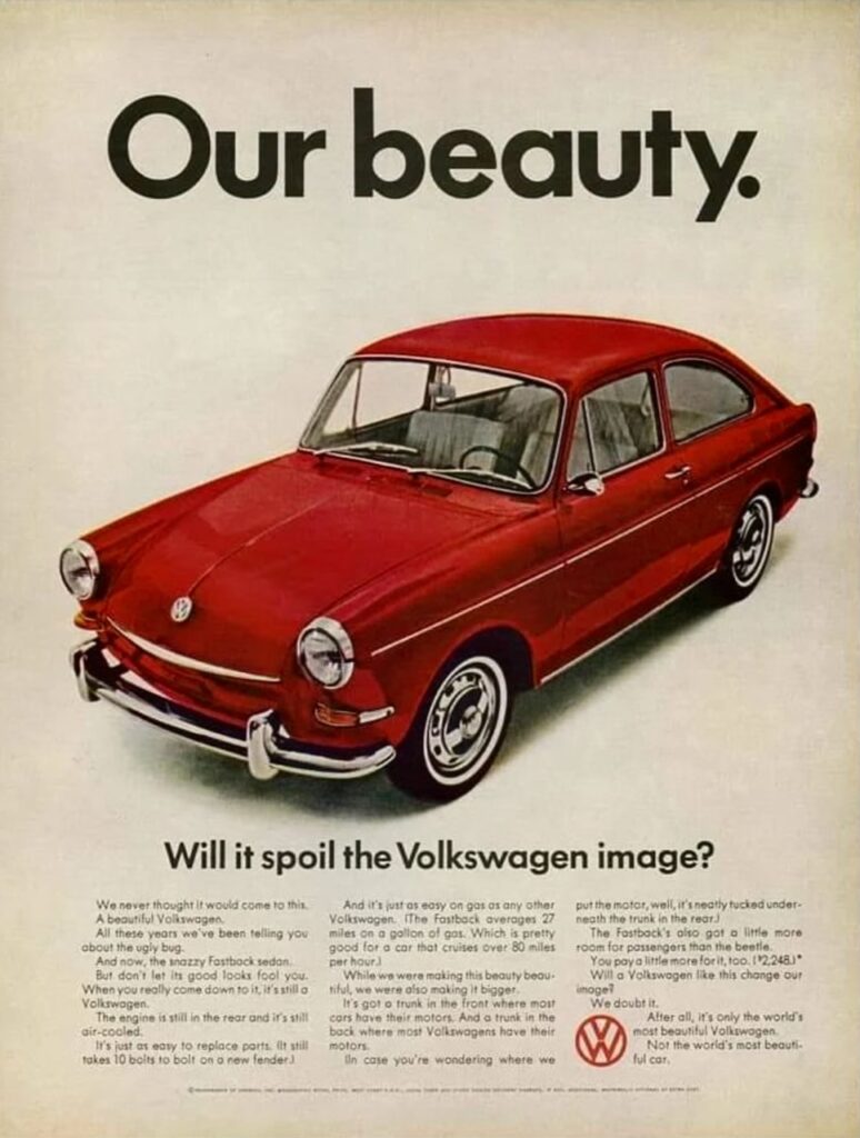 Classic VW Fastback Vintage Advertisement with red VW Fastback.
