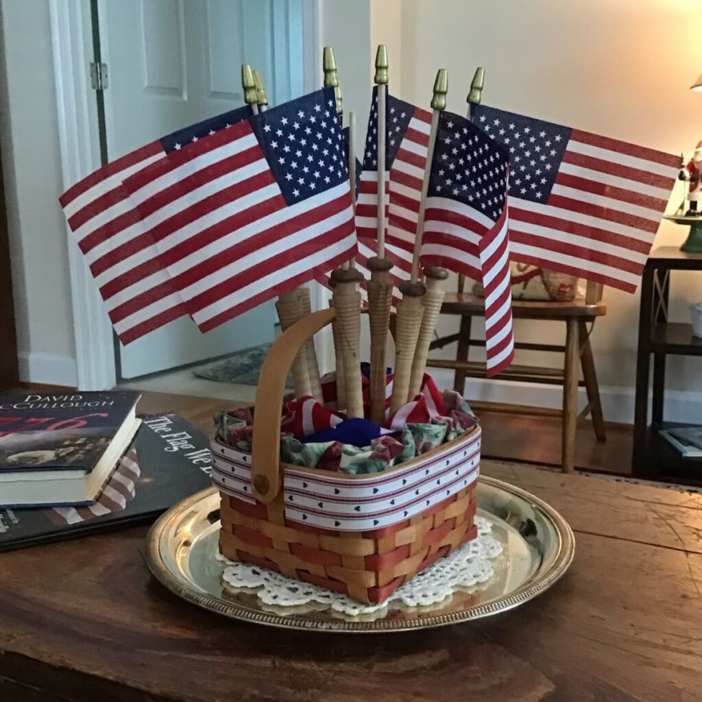 Barbara's DIY American Flag Wooden Spindles in a basket.