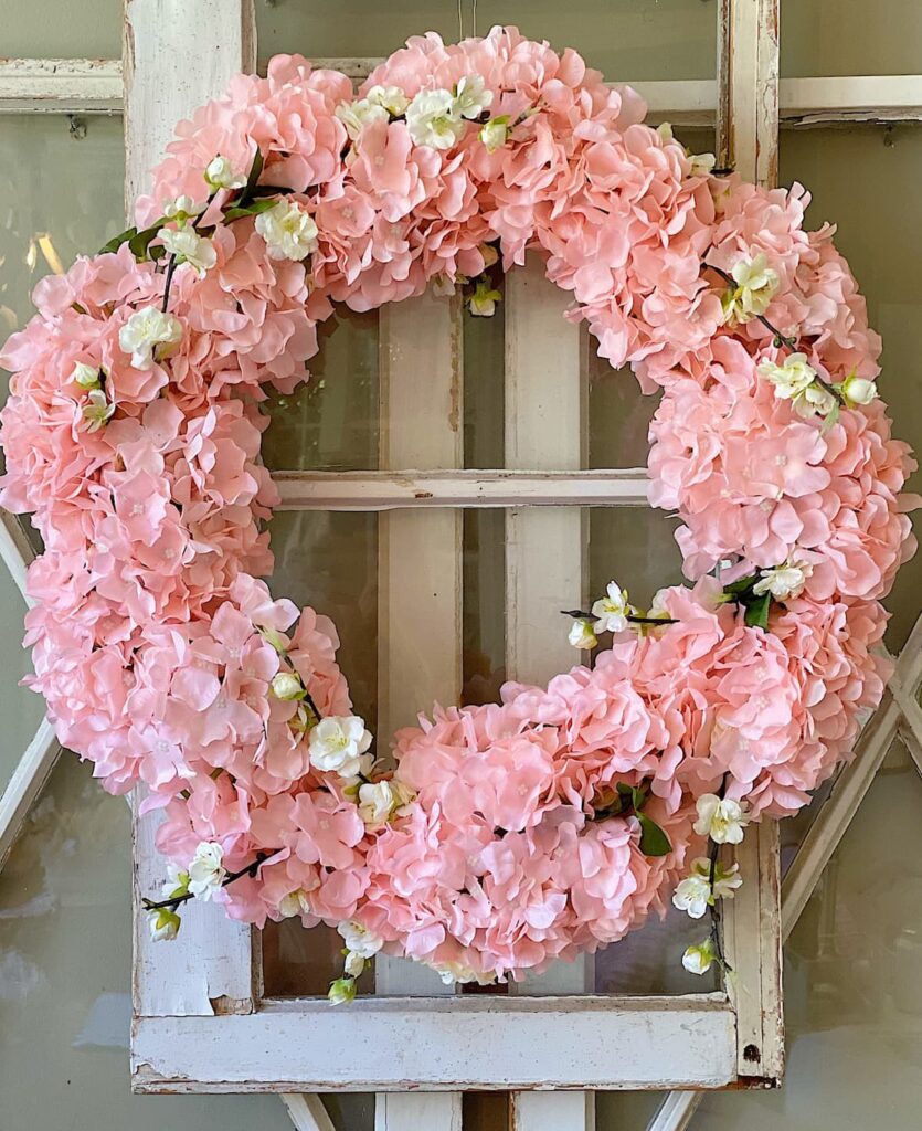 Pink Hydrangeas DIY Wreath on white salvaged window for spring.