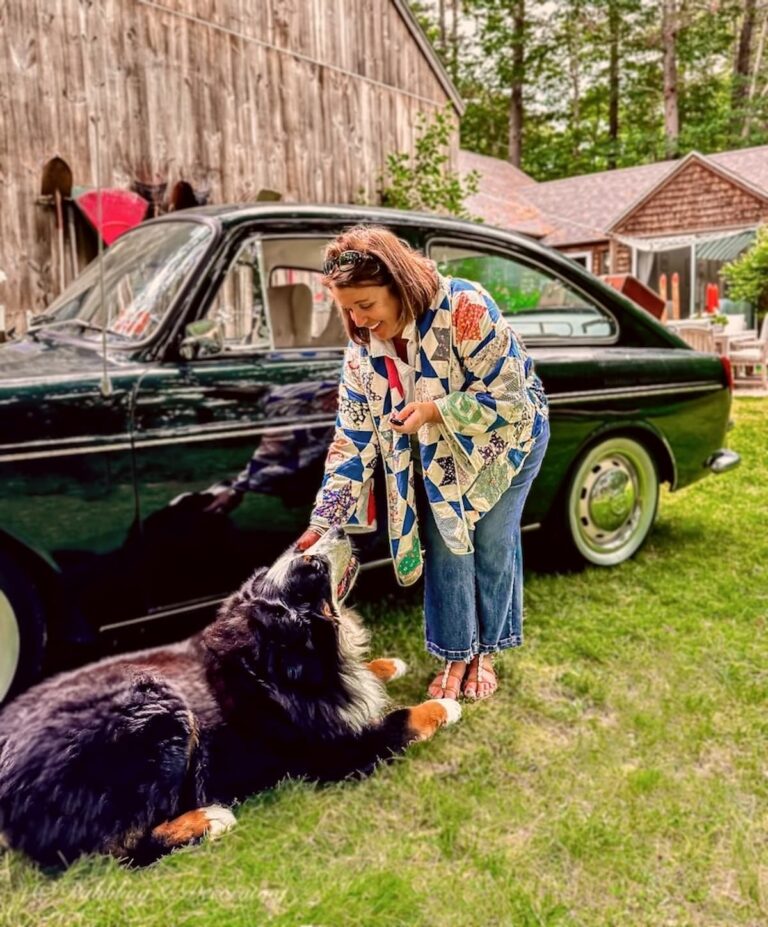 Woman in Quilt Jacket with Bernese Mountain Dog, VW Vintage Car.