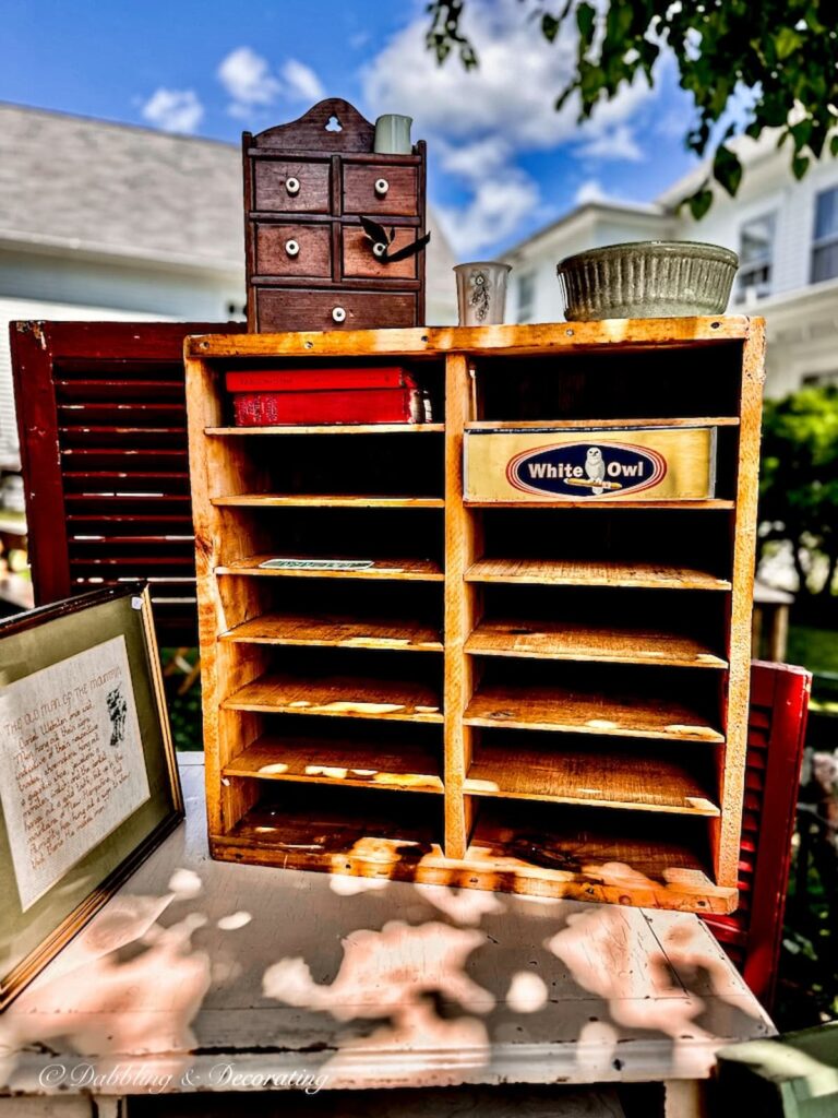 Antique pie safe at outdoor flea market sale.