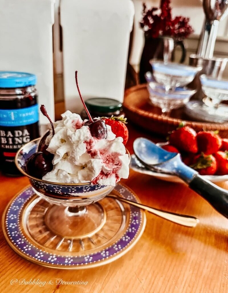 Old fashioned ice cream sundae on wooden kitchen counter.