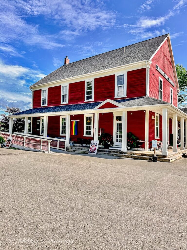 Bleeker and Greer Market, a red large building in Rockport, Maine, Maine Coastal Towns.