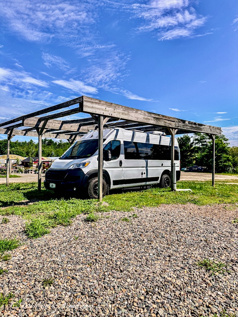 White Panoramic RV under Pergola at Bleeker and Greer Market in Rockport, Maine.