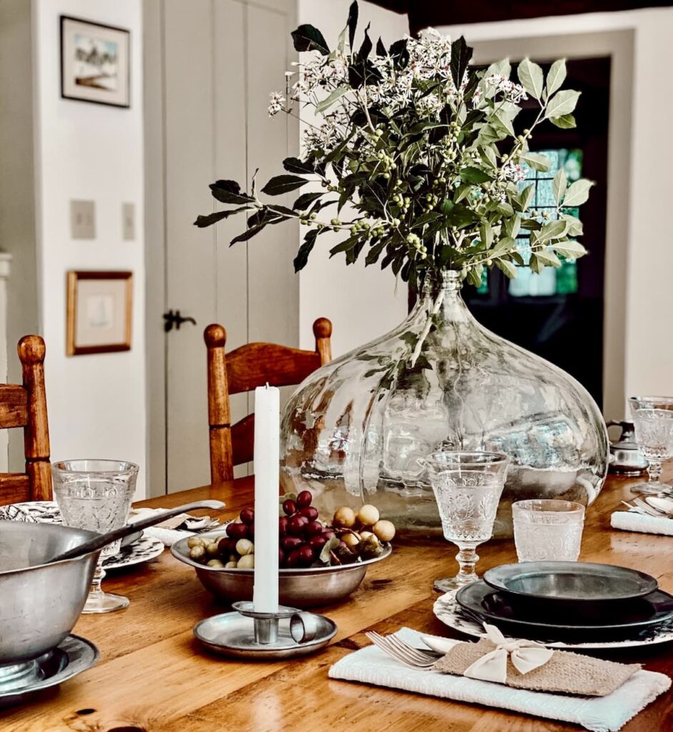 Primitive antique pewter and transferware table setting for fall.