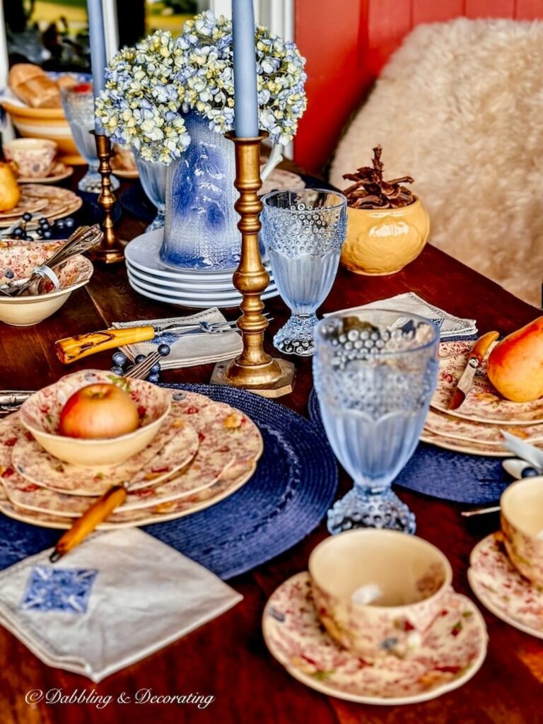 blue and white fall tablescape with blue accents.