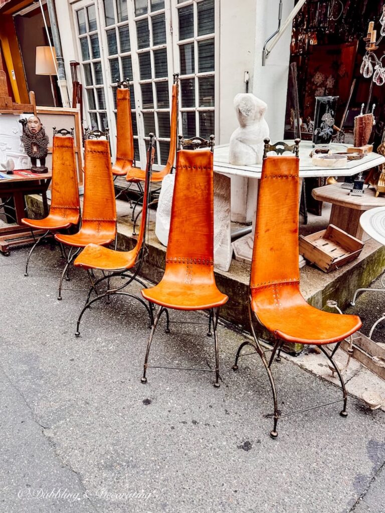 Vintage leather unique chairs at French flea market.