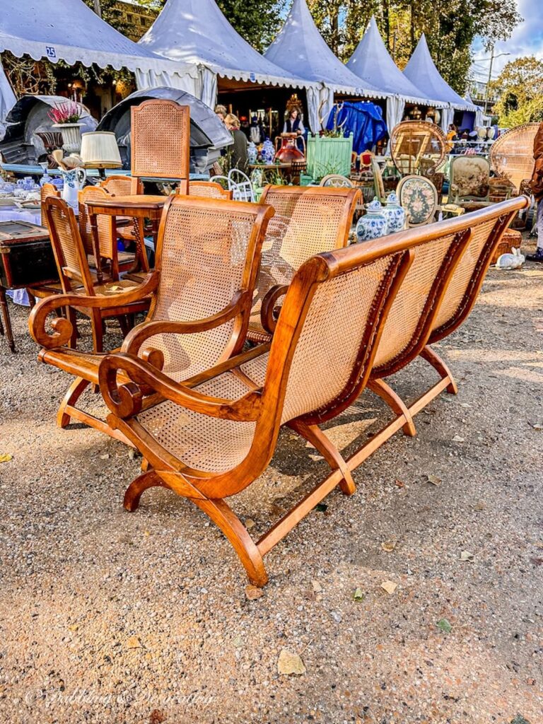 Set of cane chairs at flea market in Paris.