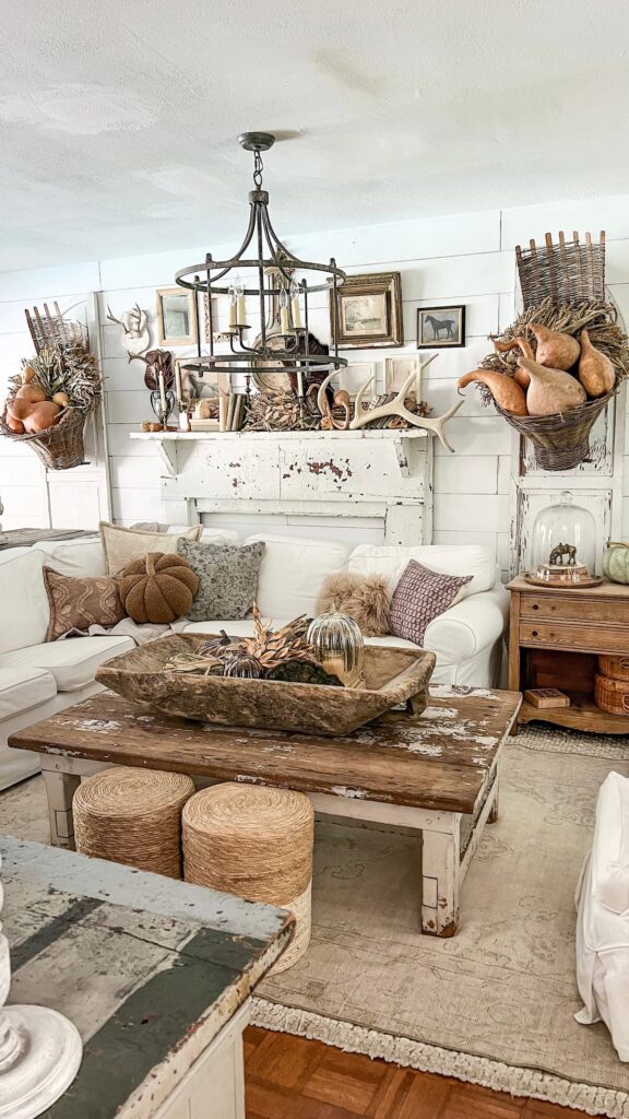 Neutral Farmhouse vintage living room design.