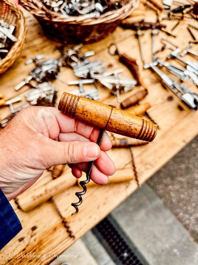 Antique wine corkscrew at an open air flea market.