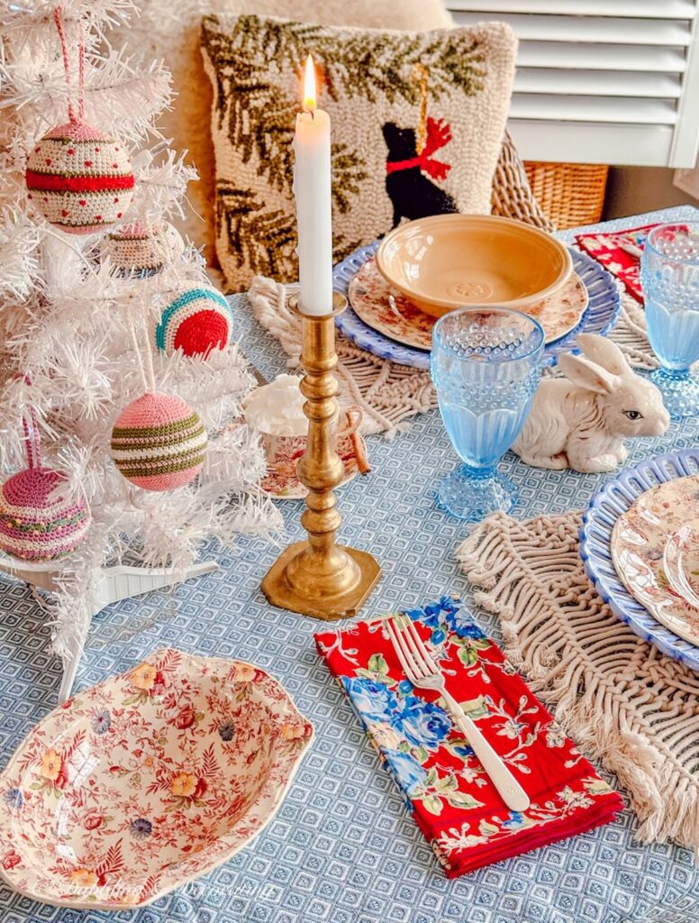 Simple winter table decorations on blue Mountain Weaver tablecloth vintage thrifted finds.