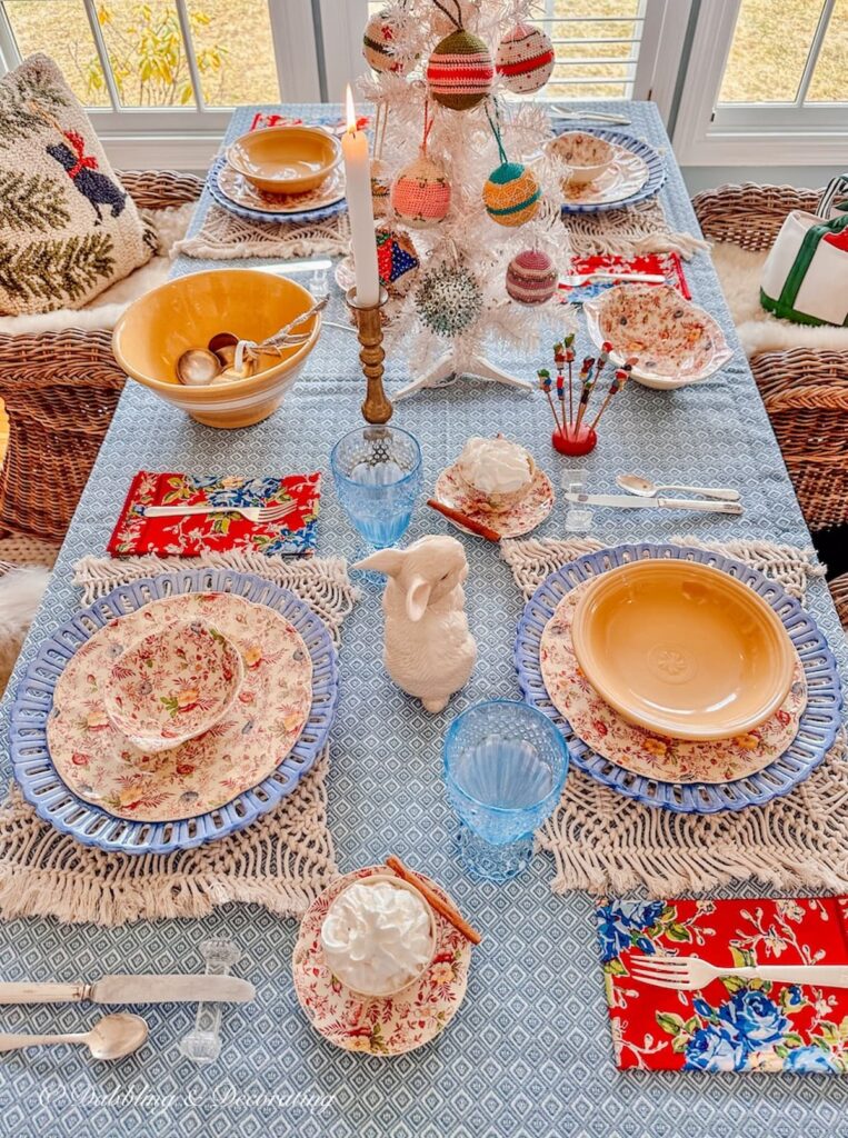 Blue and yellow simple winter decorations on dining room table.  Fun and whimsical.