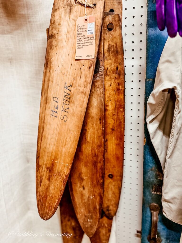 Vintage trapper fur stretchers in antique store.