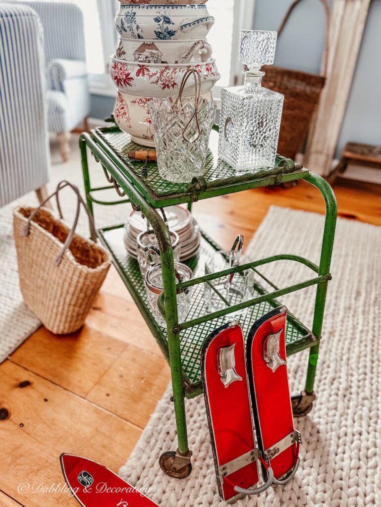 Brenter Schibob accessories next to antique bar cart from Paris antiquing trip.