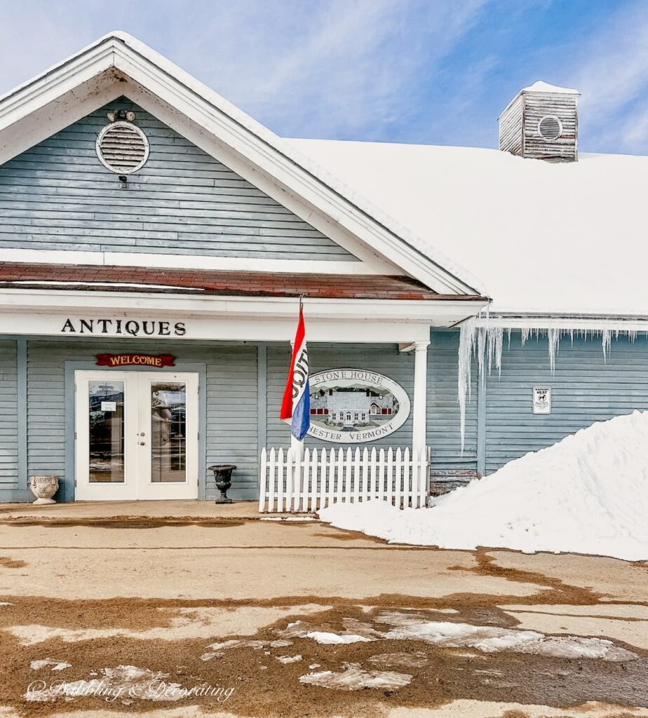 Blue Antique building in the snow in Vermont.