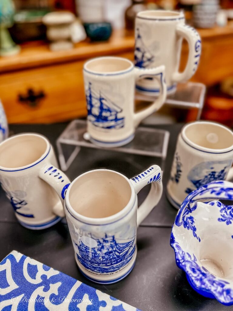 4 Blue and white Delft mugs in thrift store.