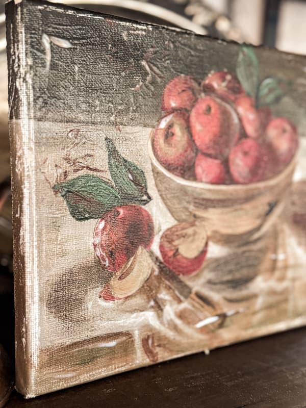 Vintage painting of apples in bowl for eclectic interiors.